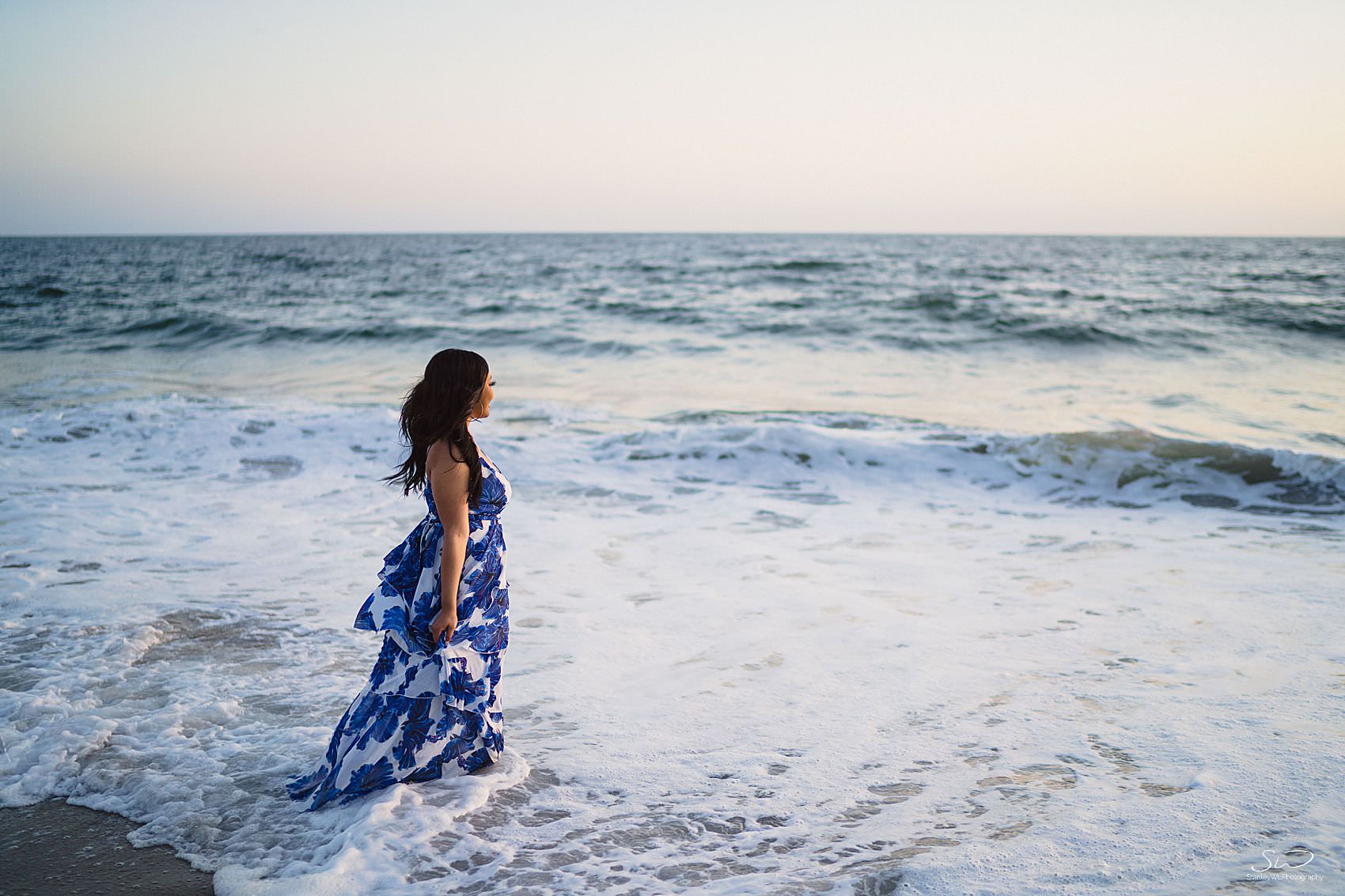 malibu beach graduation portrait of graduate looking off into the ocean